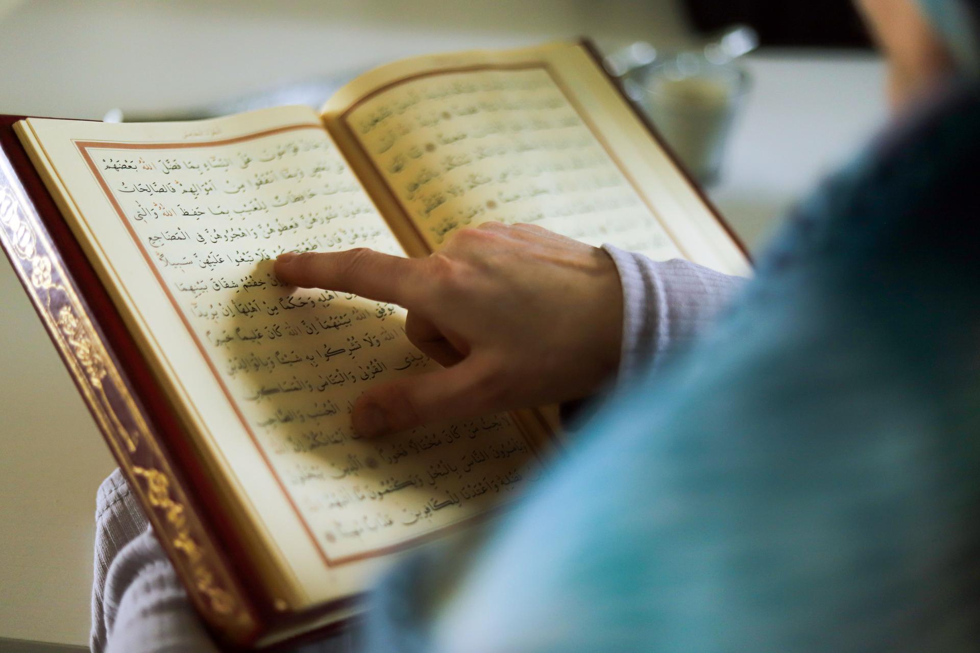 Holy Quran, Woman reading the Quran, Muslim Worship,Ramadan, Holy Day