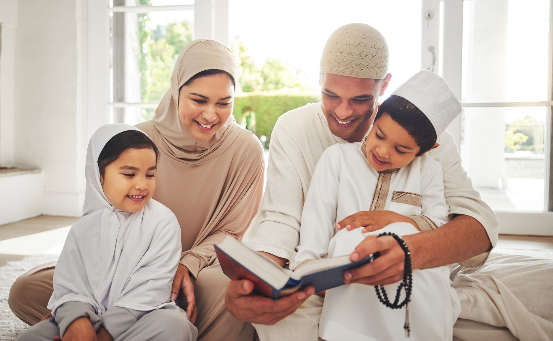 Happy family, Muslim parents or children reading book for learning, Islamic knowledge or studying in Allah or God. Support, dad or Arabic mom teaching kids worship, prayer or holy Quran at home